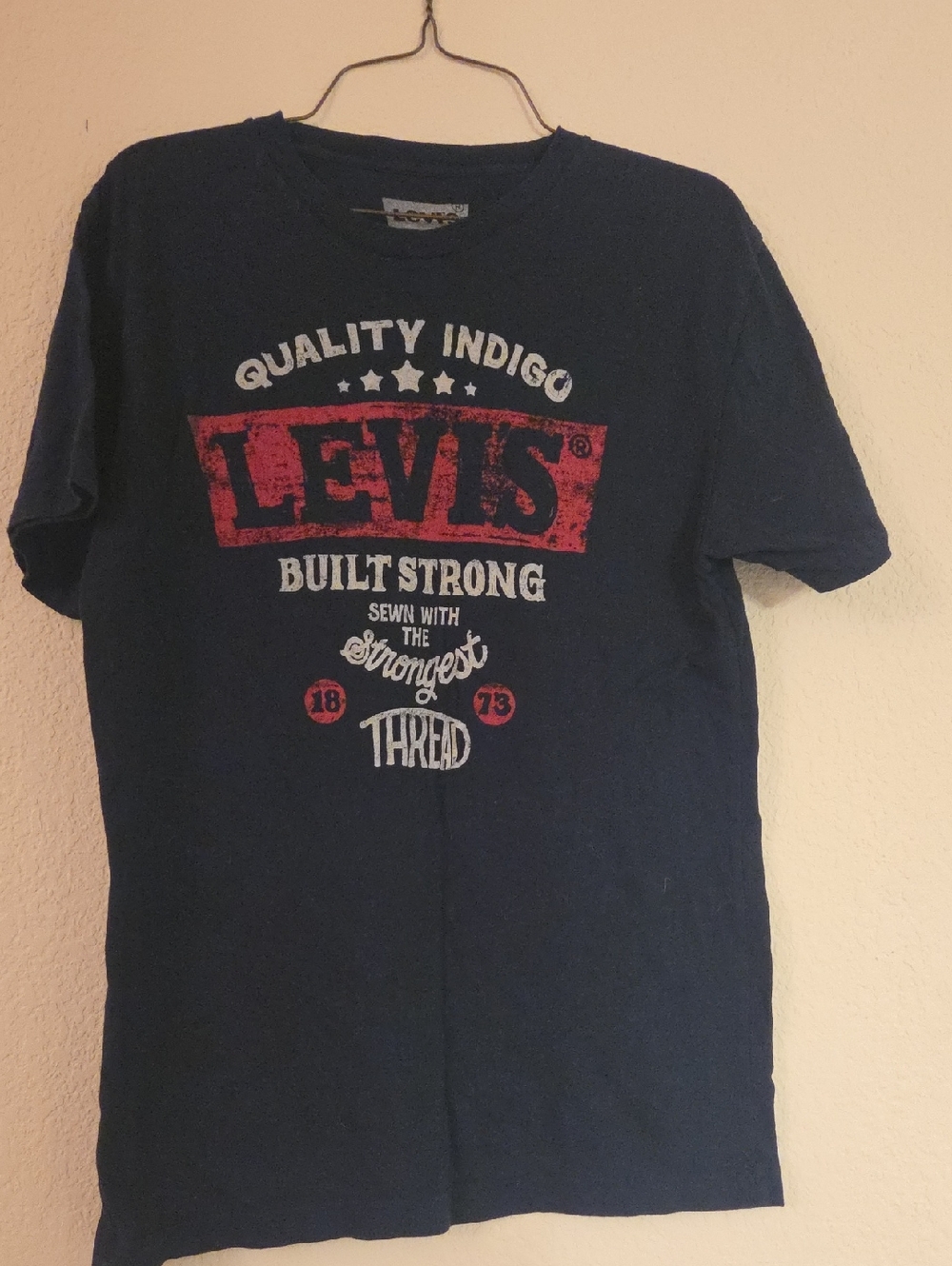Levi's Navy Blue Graphic Tee with Red and White Logo